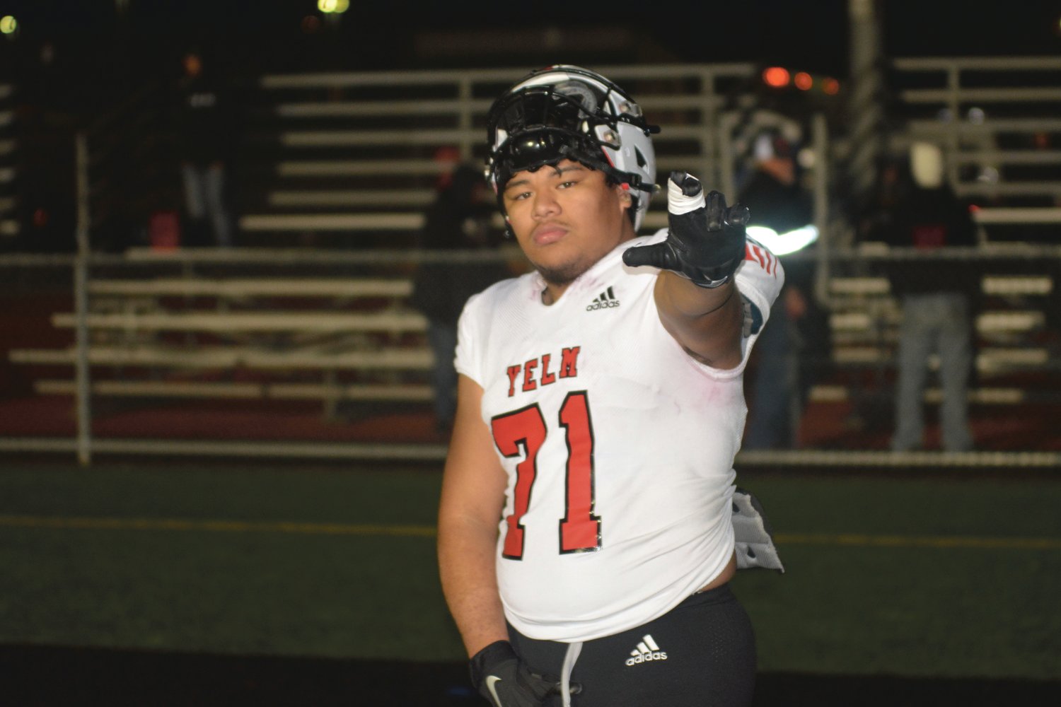 Senior right tackle Ami Fakava poses for a photo after Yelm defeated Gig Harbor 50-14 on Thursday, Oct. 27.