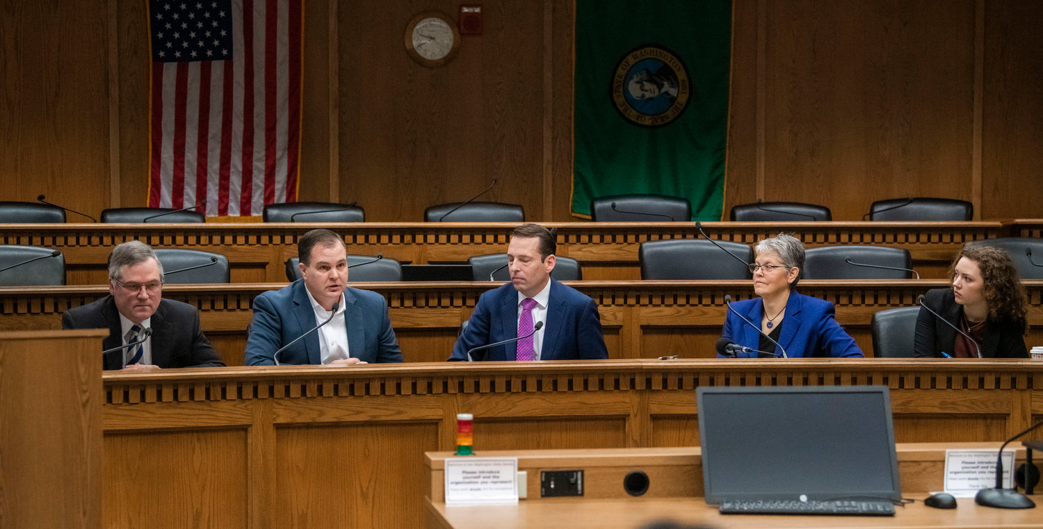 From left, State Rep. J.T. Wilcox, R-Yelm, Sen. John Braun, R-Centralia, Andy Billig, D-Spokane, and Speaker of the House Laurie Jinkins, D-Tacoma, take turns answering questions from members of the press inside the John A. Cherberg Building in Olympia on Thursday, Jan. 5.