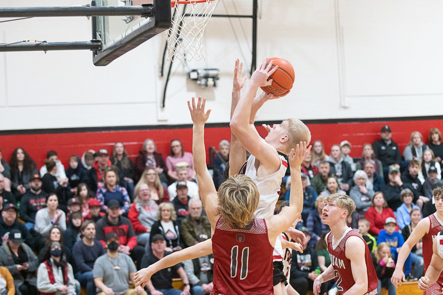 Austin Gonia goes up in traffic during the first quarter of Tenino's 47-33 loss to Hoquiam on Jan. 24.