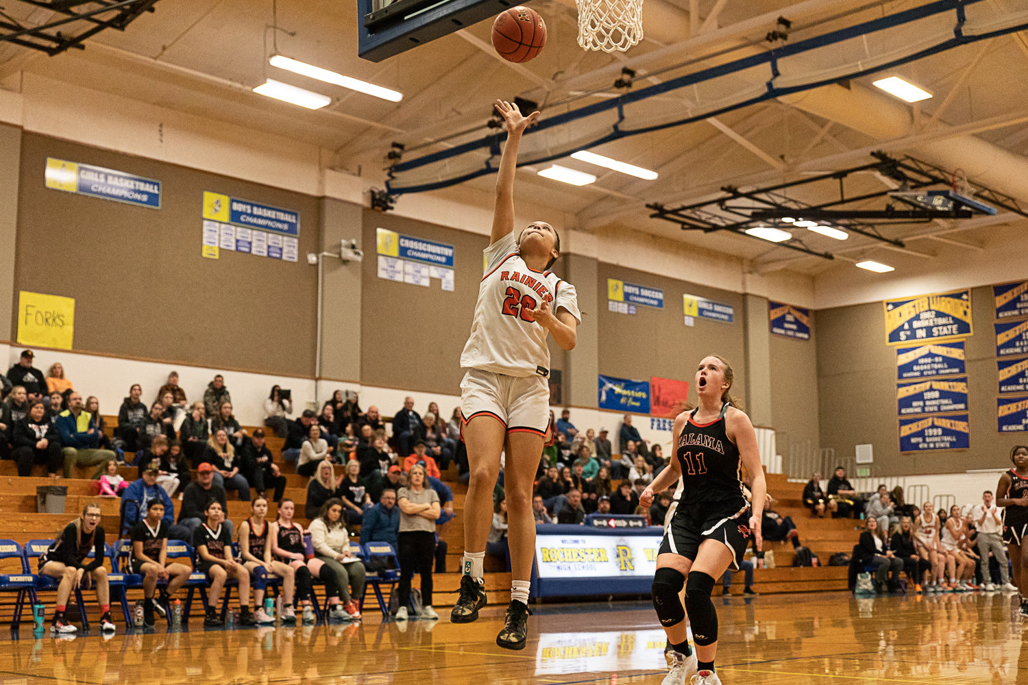 Rainier forward Janess Blackburn takes and makes a breakaway layup against Kalama in the first round of the 2B District tournament Feb. 4 at Rochester.