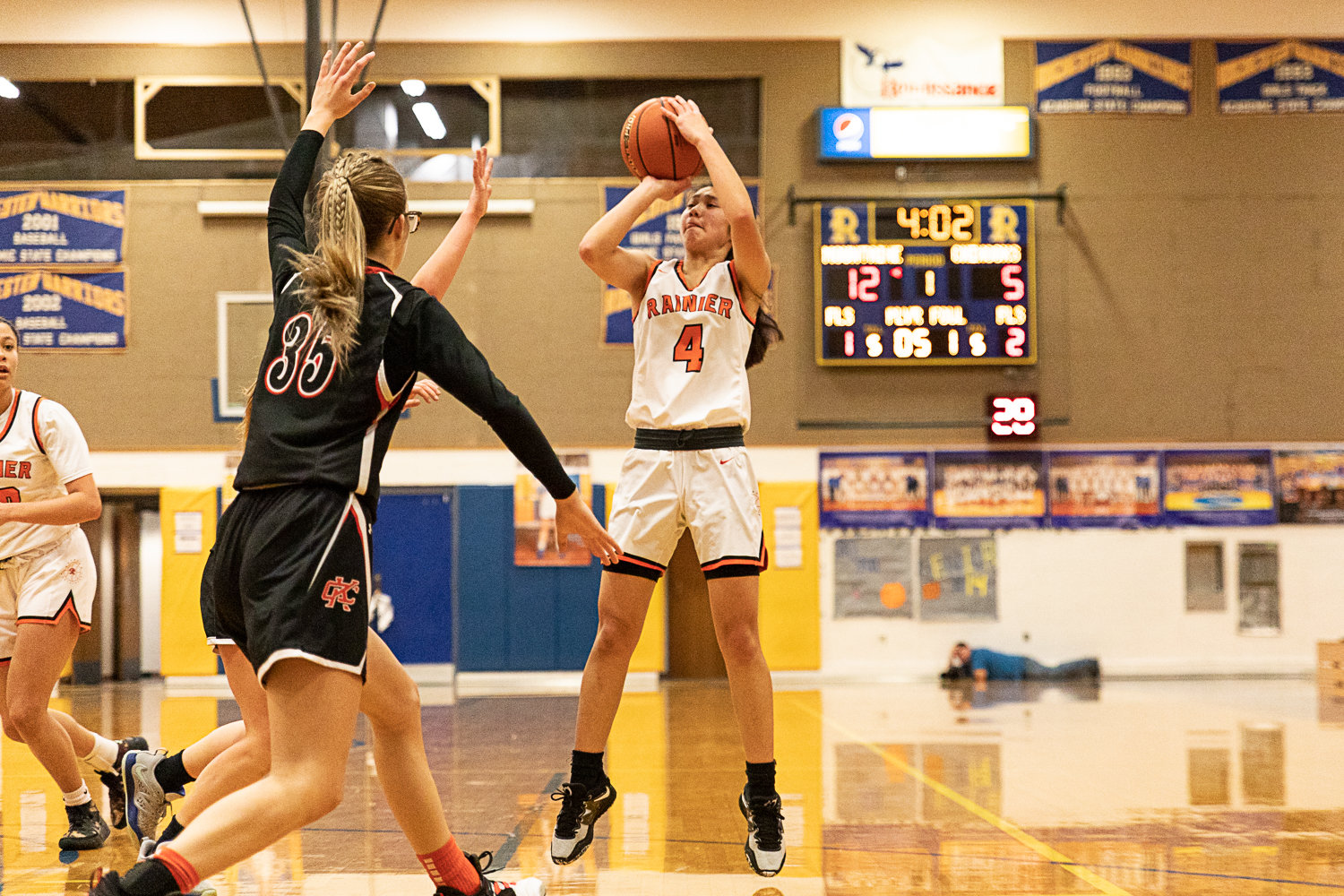Rainier guard Angelica Askey fires up a shot against Kalama in the first round of the 2B District tournament Feb. 4 at Rochester.