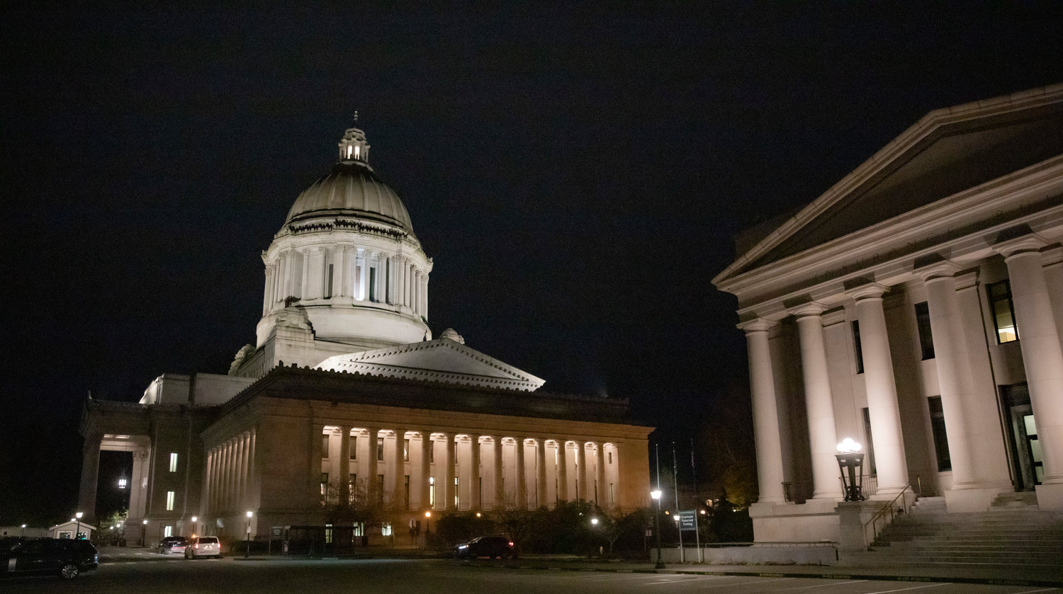 The Capitol building in Olympia, home to the Senate and House chambers, is lit up on the evening of Thursday, Feb. 16.