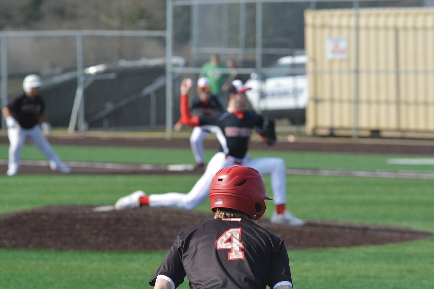 Senior Tornado Aden Schaler looks to home plate as Steilacoom delivers a pitch on Friday, March 17.