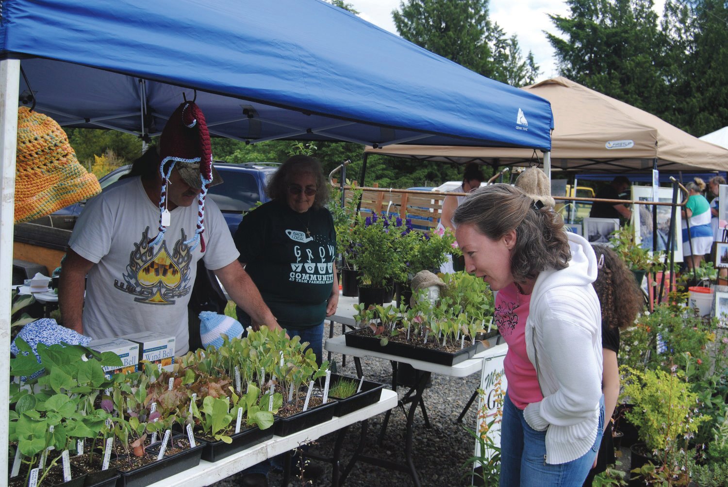 Vendors participate in a previous Yelm Farmers Market. This year, the market will be held on McKenzie Street near the Yelm Police Station.