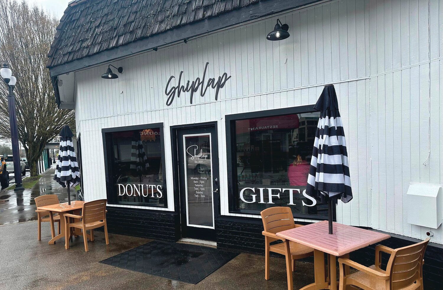 Shiplap Shop and Coffee House’s new front entrance faces Yelm Avenue and includes outdoor seating.