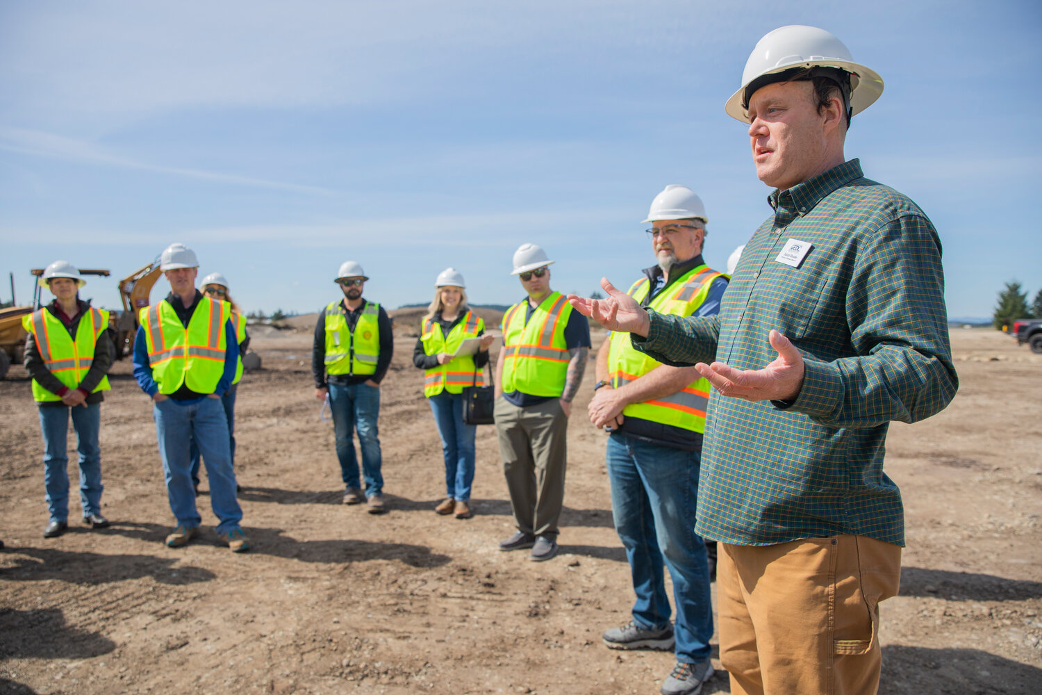 Aslan Meade, the director of Strategic Alliances for the Thurston Economic Development Council, talks about ongoing construction at the site of an agricultural park along Old Highway 99 SE in Tenino on Thursday, April 27, 2023.