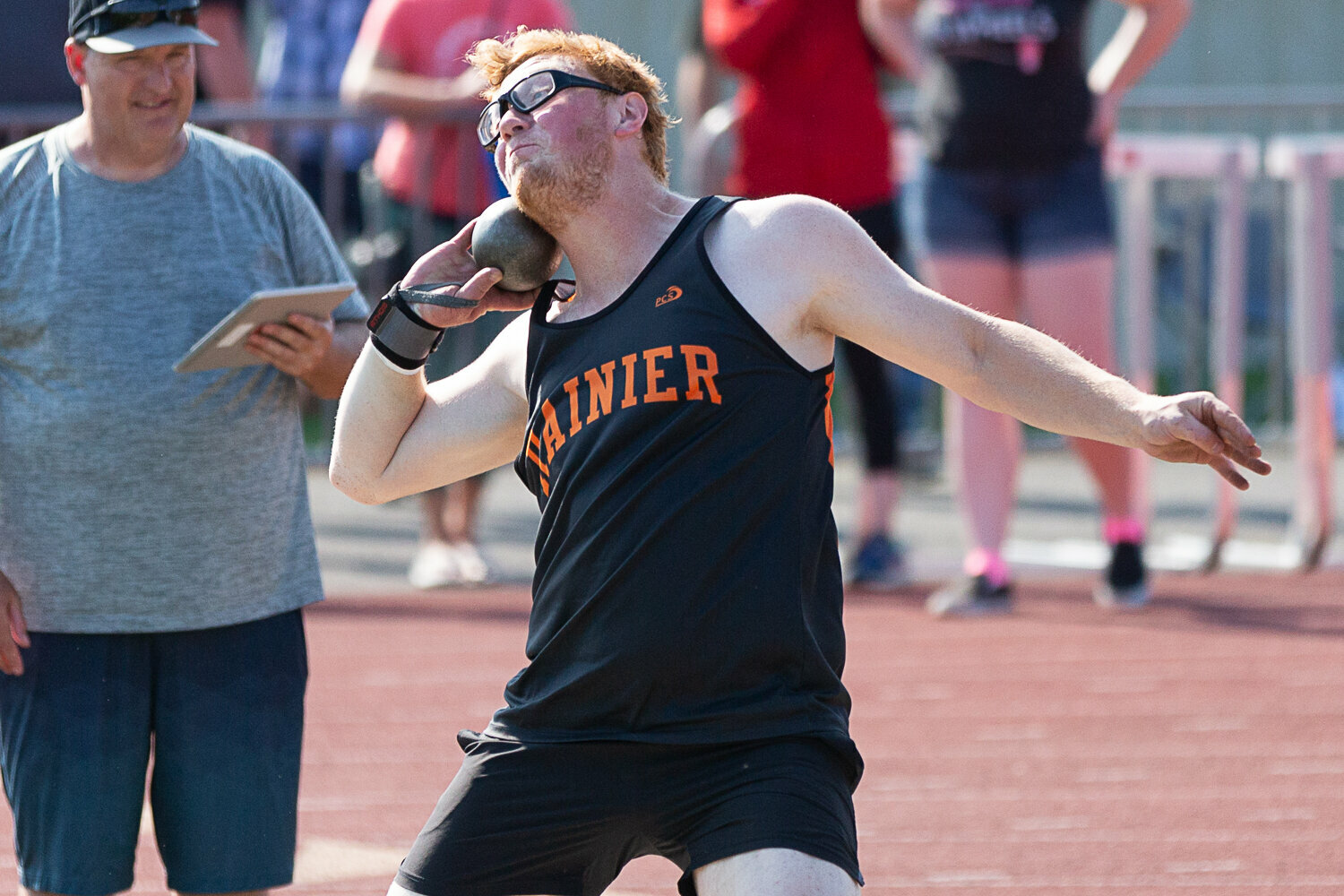 Rainier's Matthew Kenney looks to huck the shot put May 19 at W.F. West in the 2B District 4 Championships.