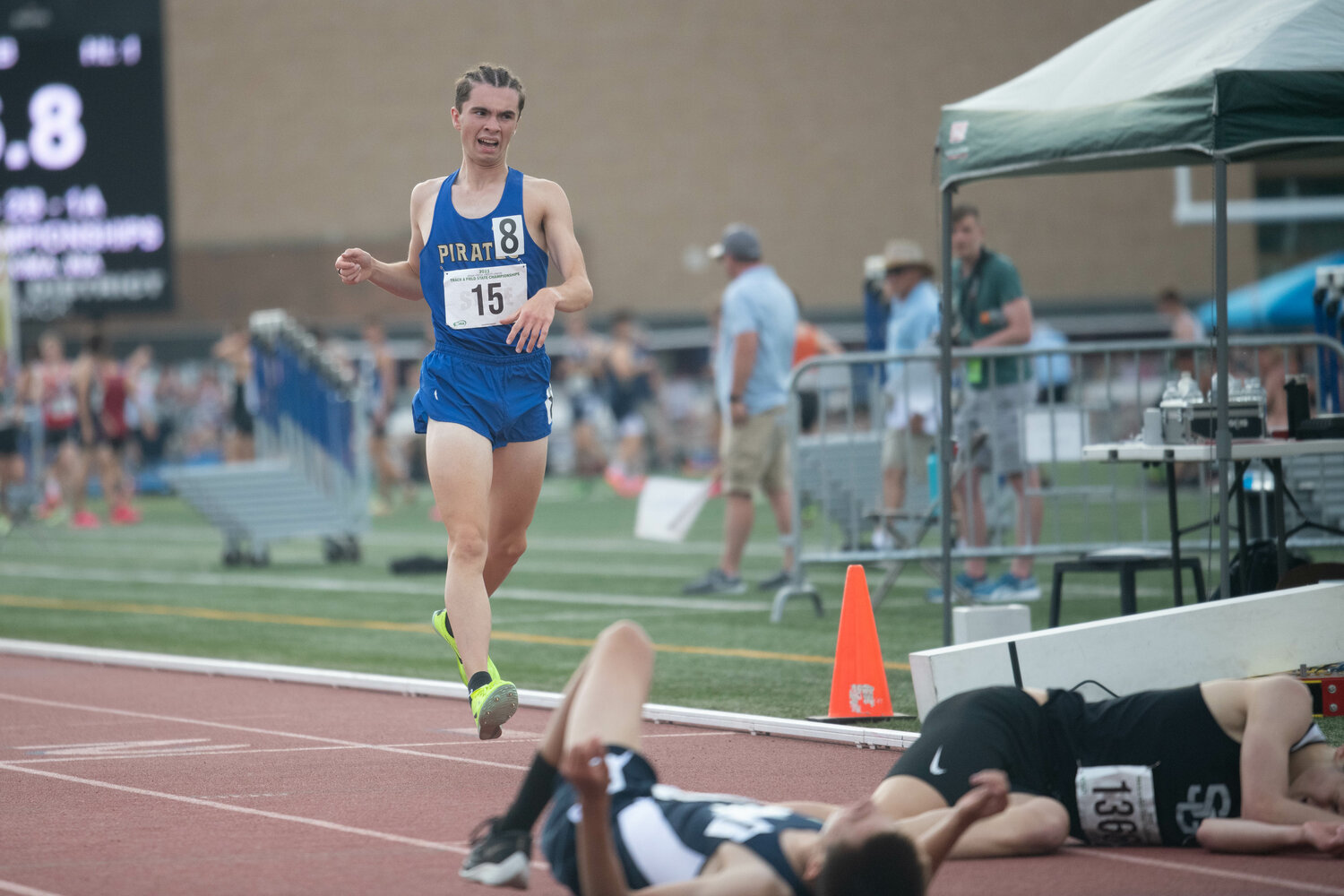 Adna's Jordan Stout comes to the finish line to take third behind a diving photo finish in the 1,600 meters at the 2B state championships at Zaepfel Stadium in Yakima on May 25.