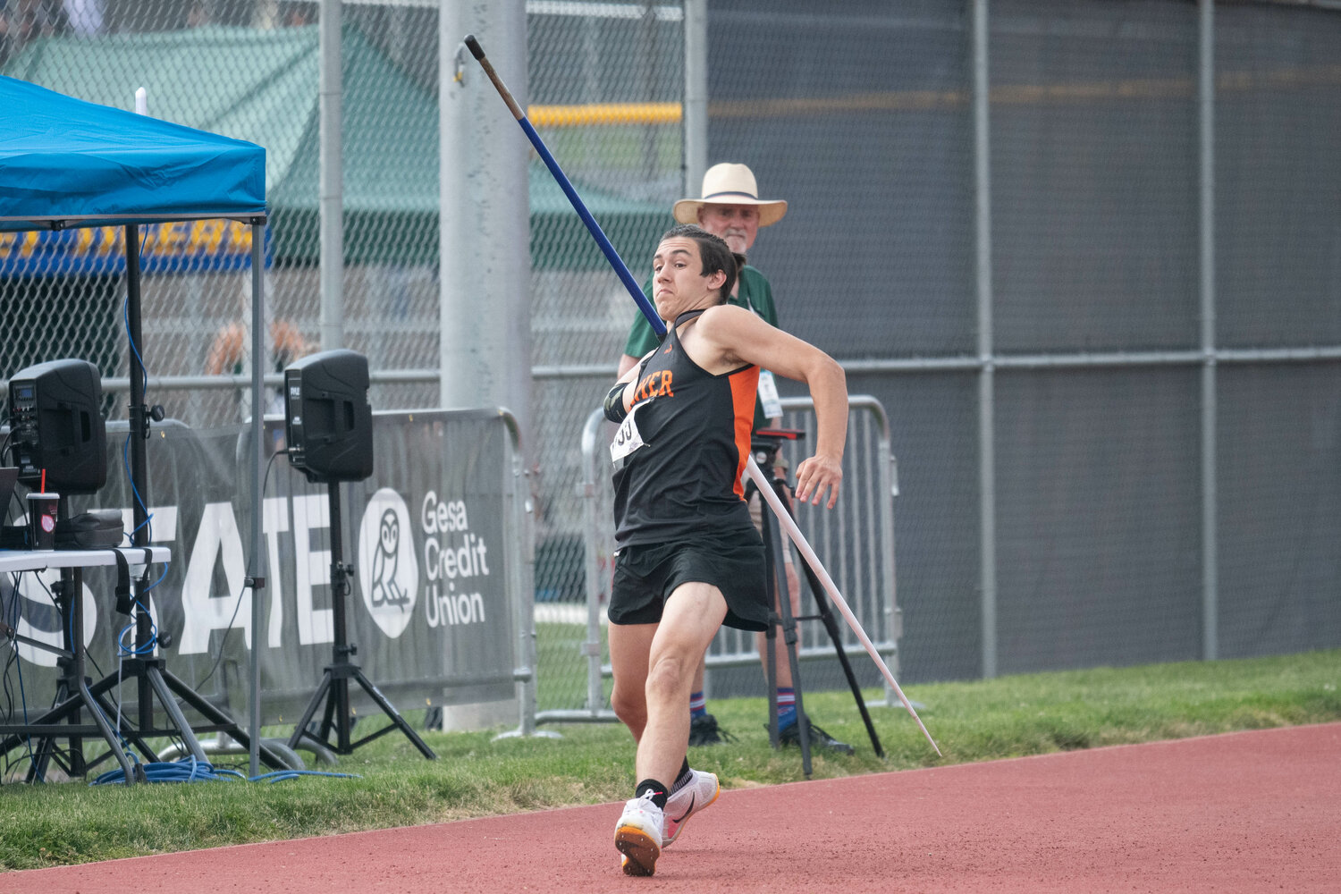 Rainier's Zander Peck throws the javelin during the finals of the 2B state championships at Zaepfel Stadium in Yakima on May 25.