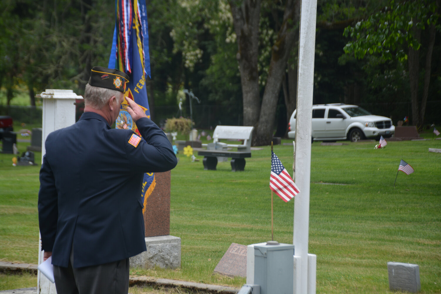 Steven Slater salutes an American Flag on Memorial Day.