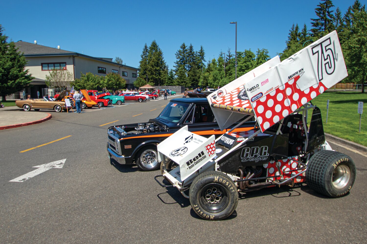 While most brought project cars like classic and muscle cars to the Yelm High School car show on June 4, Chris Greene, of Spanaway, decided to showcase his sprint car which he races on dirt tracks throughout western Washington.