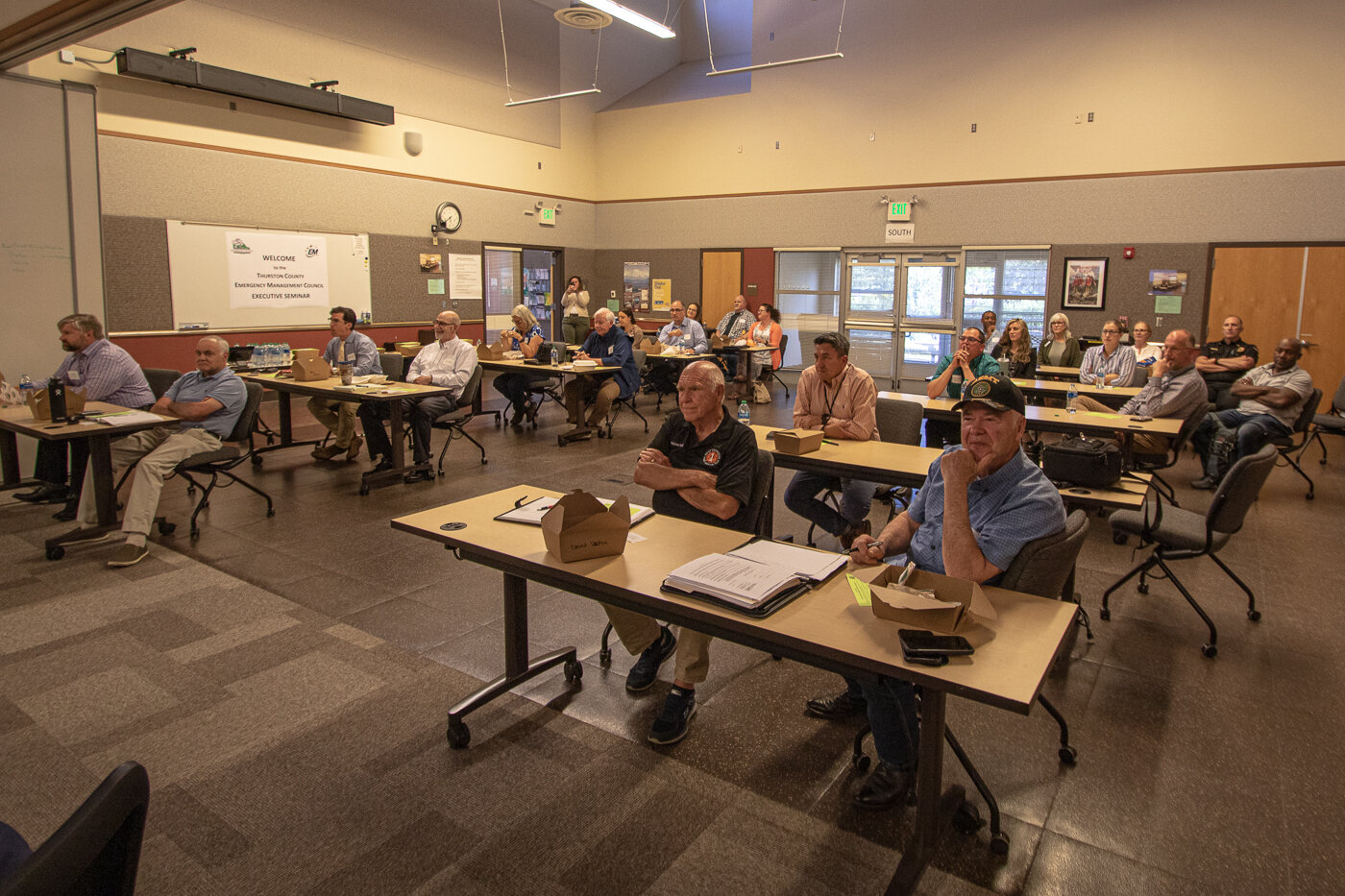 County and city officials from throughout Thurston County gathered Monday evening at the Thurston County Emergency Management building for an executive seminar on the upcoming wildfire season.