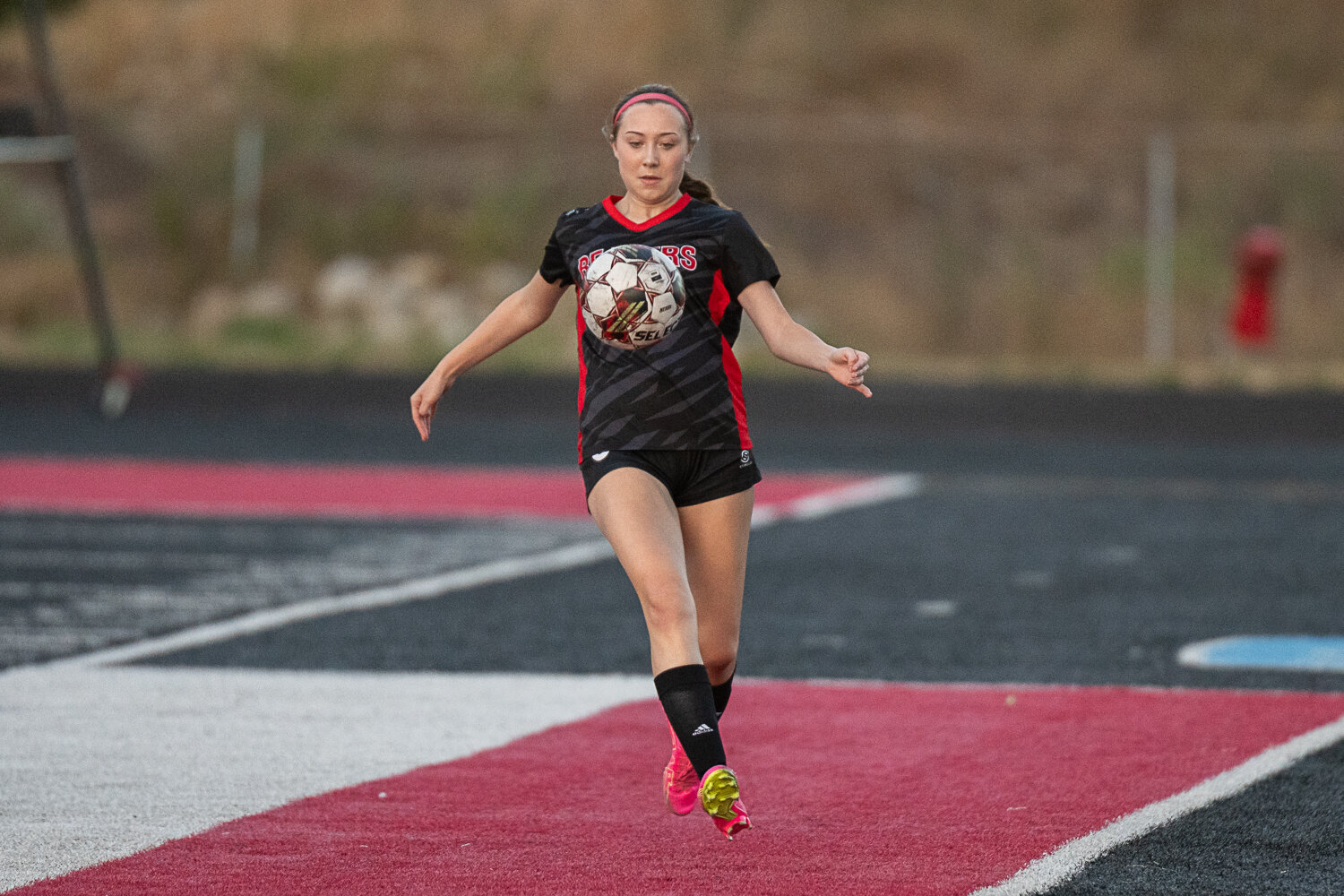 Abagail Archibald runs down a ball during Tenino's 0-0 draw against Adna, at home on Sept. 14.