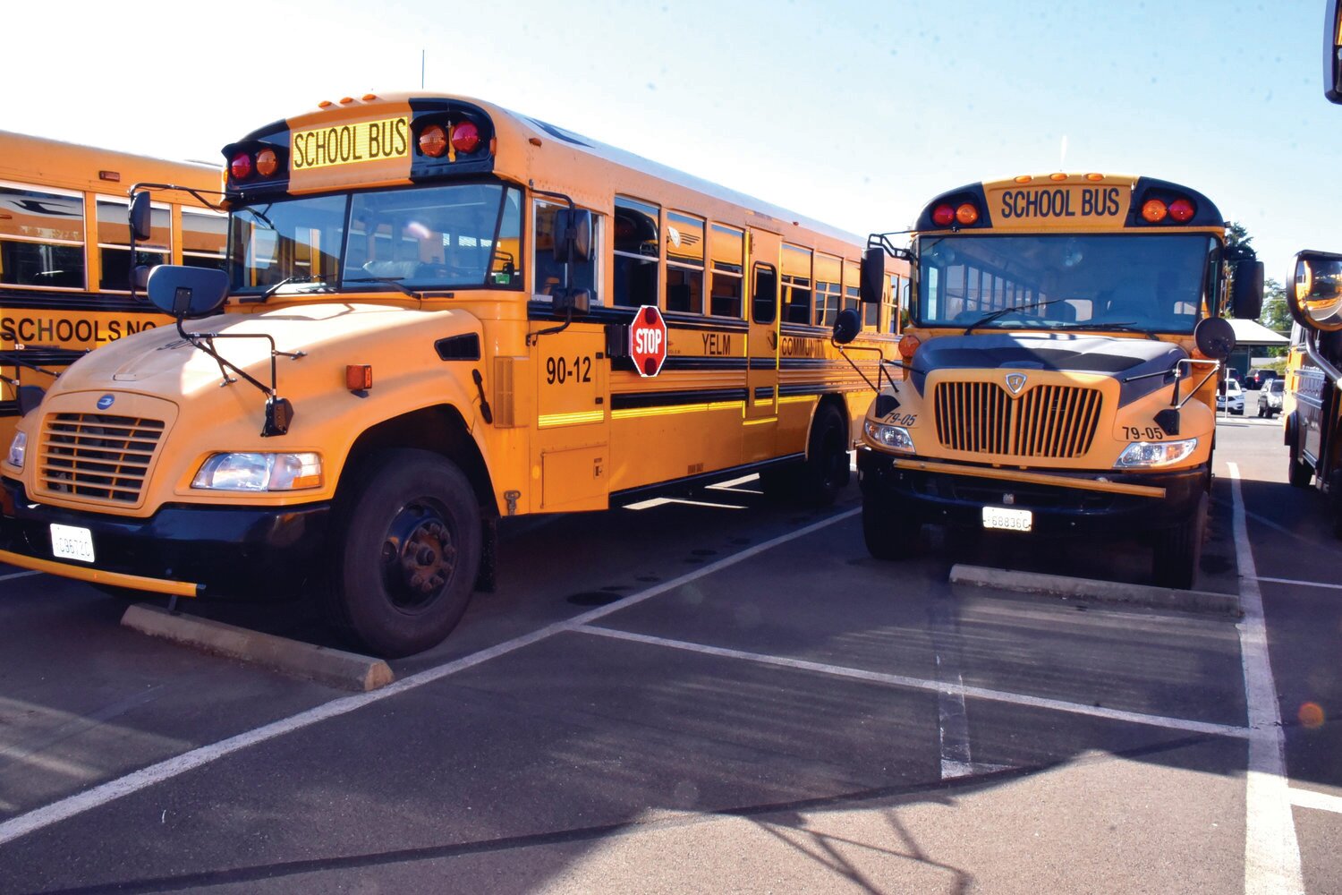 Yelm Community Schools buses sit ready to be driven, yet more drivers are needed to fill all the routes. The school district recently hired a new transportation director to help address the district's challenges.