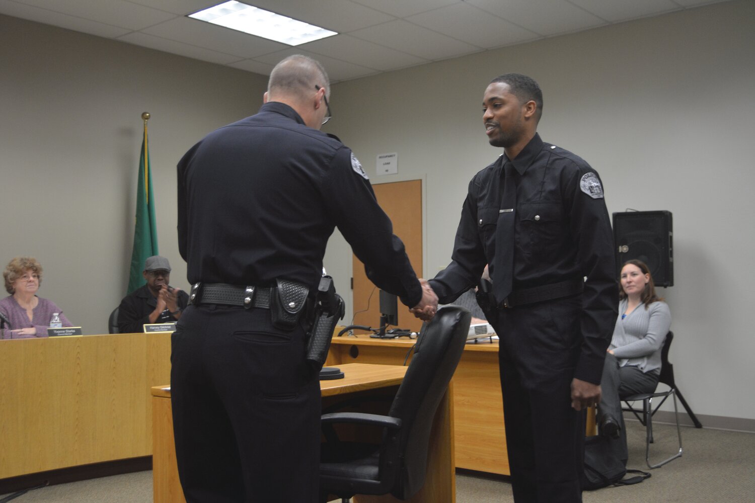 Roy officer Drew Pearson, right, is sworn in by Police Chief Paul Antista at an Oct. 23 City Council meeting.