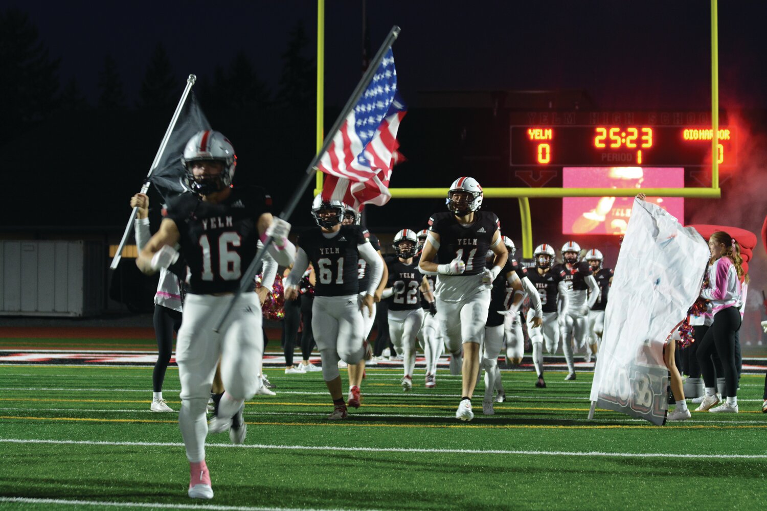 Led by junior linebacker Nathan Ford, the Yelm Tornados football team makes its way to the field for its Oct. 27 SSC championship matchup against the Gig Harbor Tides.