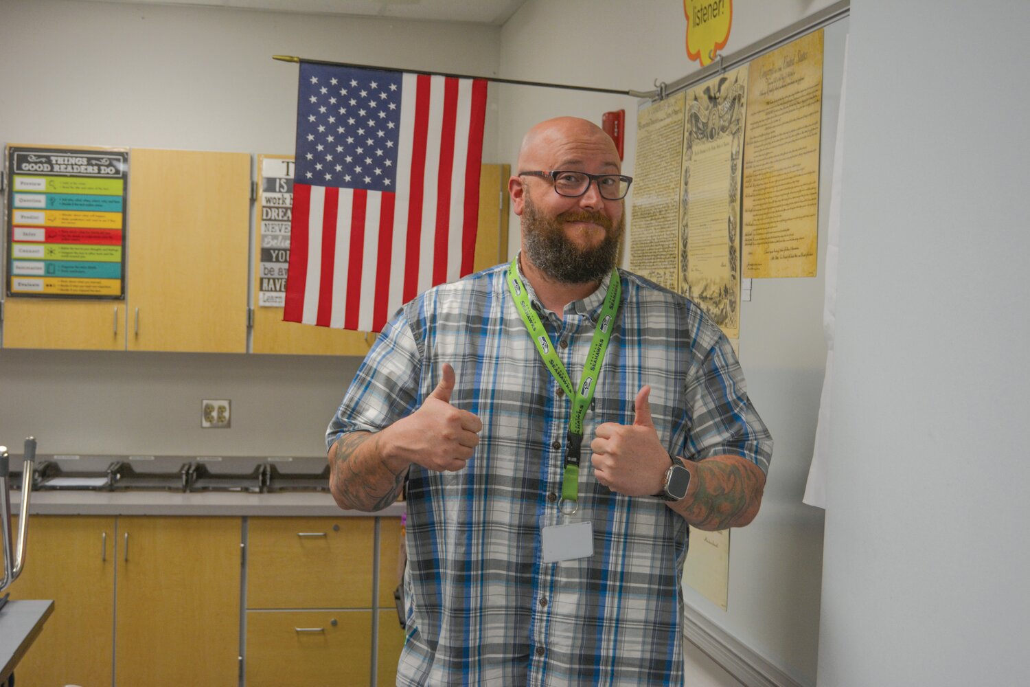 William Warren smiles in his Ridgeline Middle School classroom on Nov. 7.