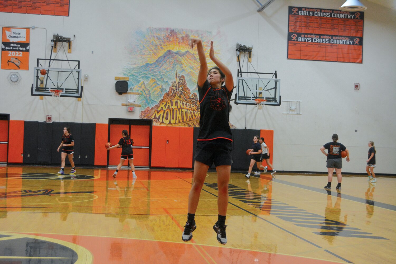 Angelica Askey shoots a jump shot during practice at Rainier High School on Nov. 15.