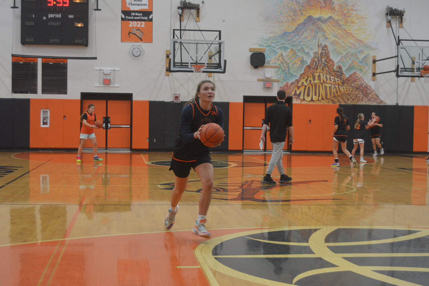 Bryn Beckman prepares to attempt a pull-up jump shot in practice at Rainier High School on Nov. 15.