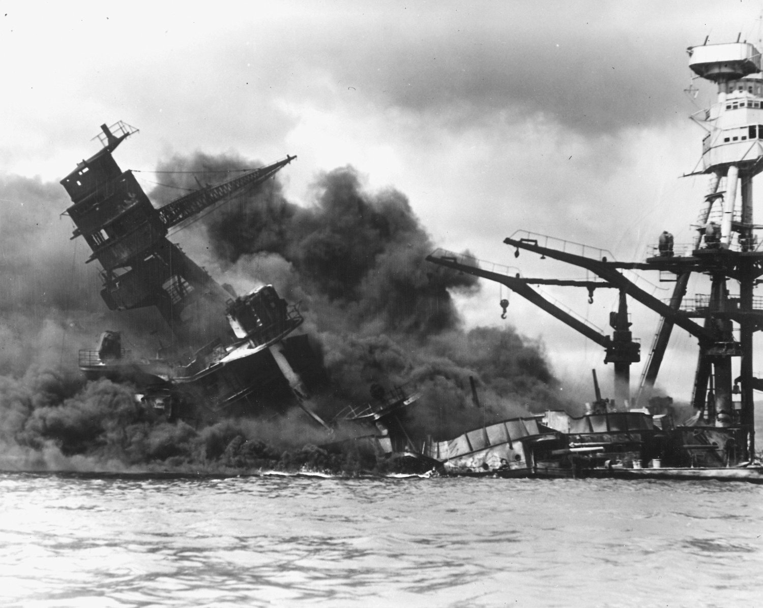 The battleship USS Arizona sinks after being hit by a Japanese air attack on Pearl Harbor, Hawaii, December 7, 1941. Picture taken December 7, 1941.