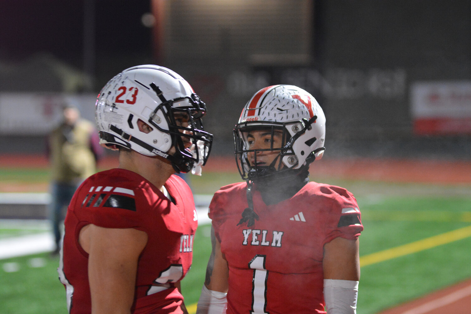 Senior team captains Brayden Platt (left) and AJ Henderson (right) reflect on Yelm’s 29-12 victory over Mount Tahoma in the 3A state quarterfinals on Nov. 17.