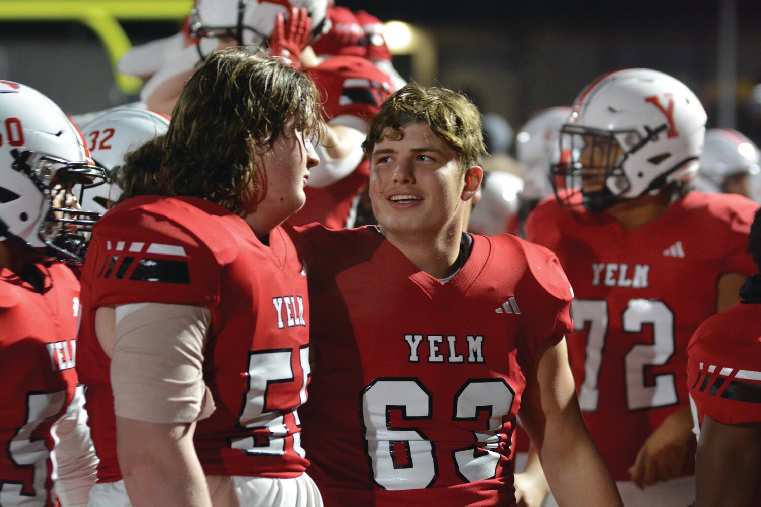 Offensive linemen Shane Creegan (left) and Jonah Smith (right) smile after Yelm defeated Mount Tahoma 29-12 in the 3A state quarterfinals on Nov. 17.