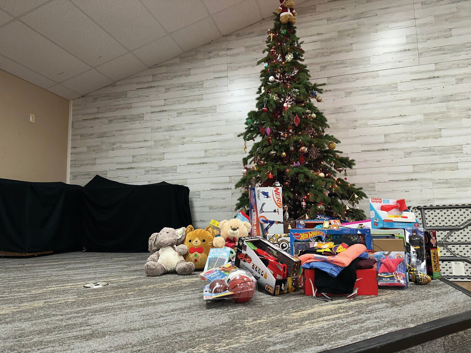 Yelm football’s toy donation sit in front of a Christmas tree on Nov. 24 at the Nisqually Valley Moose Lodge in Yelm.