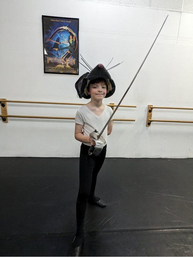 Alexander Kellum with his props for his role as the Rat Admiral during a rehearsal for "The Nutcracker."