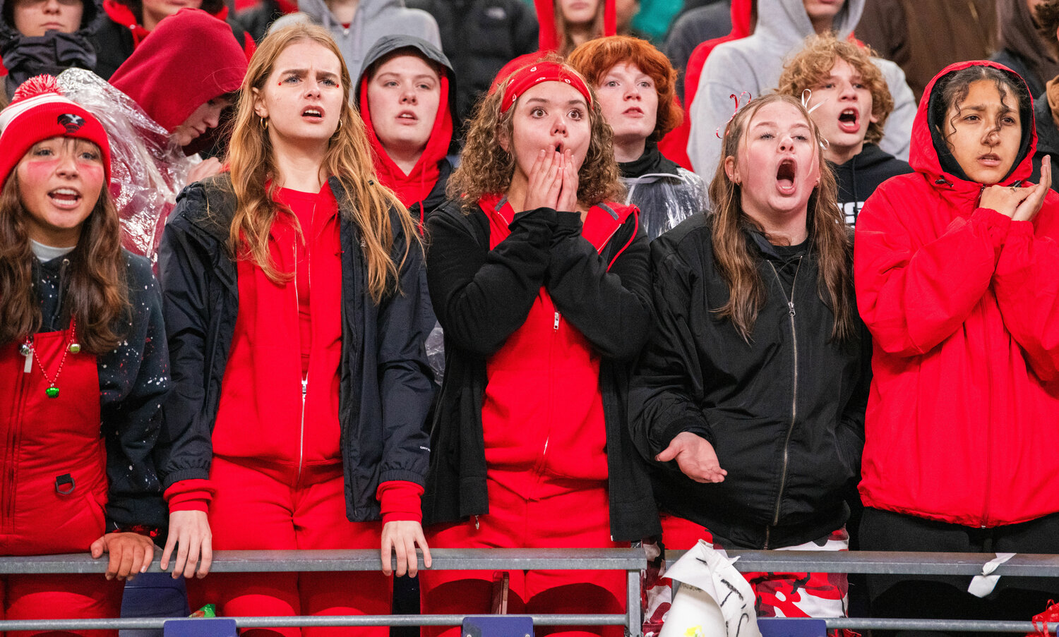Tornado fans react while watching the 3A state football championship game between Yelm and Bellevue on Friday, Dec. 1, at Husky Stadium in Seattle.