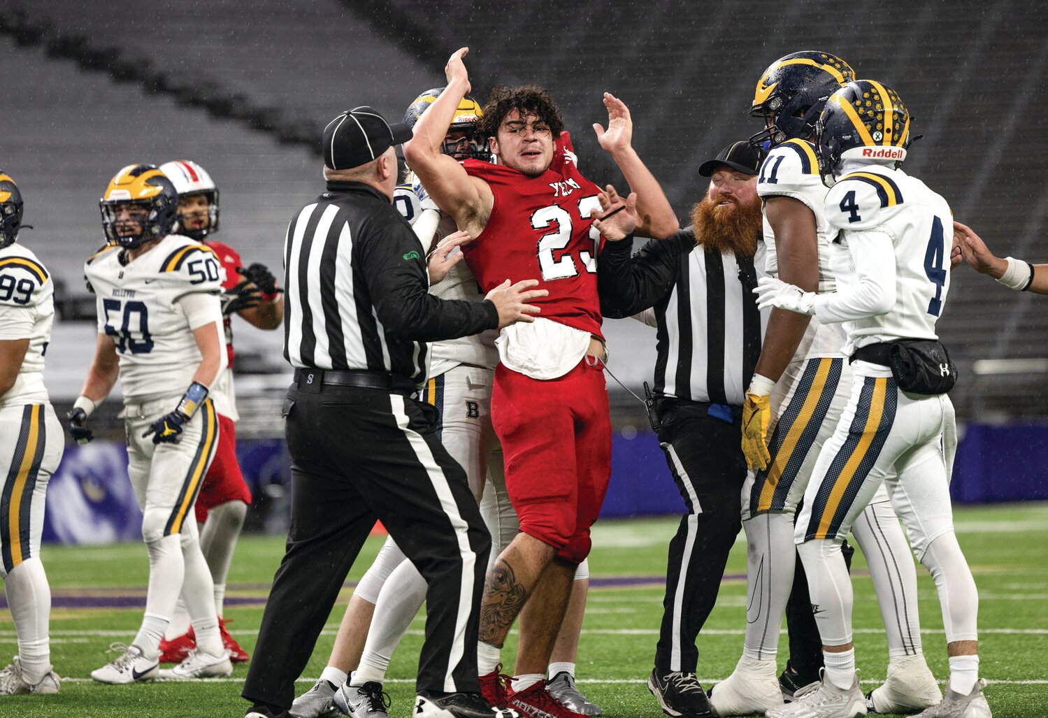 Yelm running back Brayden Platt is ejected from the 3A state championship game after an altercation with Bellevue players at Husky Stadium on Friday, Dec. 1.