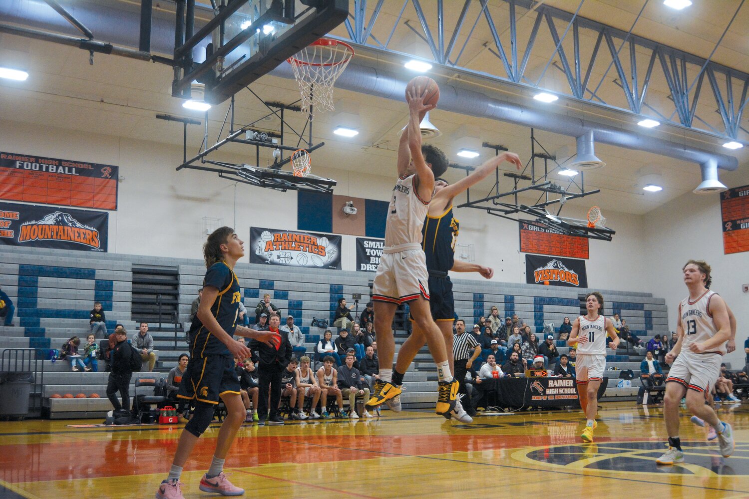Joshua Meldrum (3) jumps for a layup against Forks on Dec. 2.