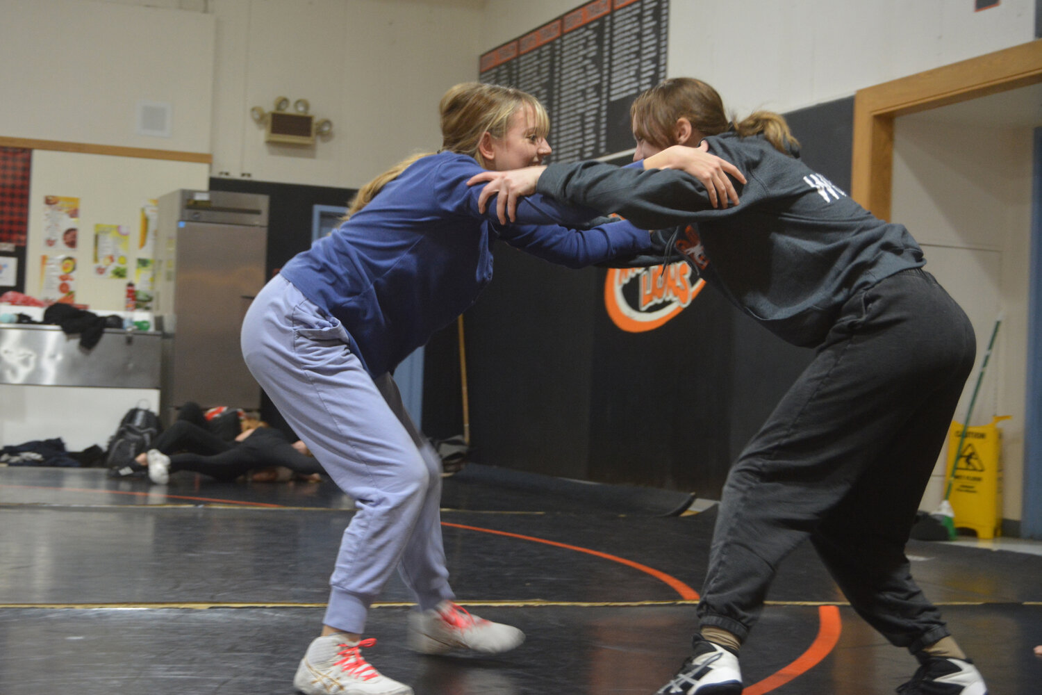 Skye Dale and Maddi Worthy prepare to wrestle during practice on Nov. 30.