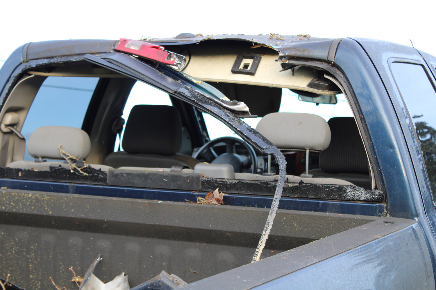 The Dodge Ram truck lost its rear mirror and suffered damage to its third brake light after crashing into a sign, a tree and a lamp post on Jan. 30.