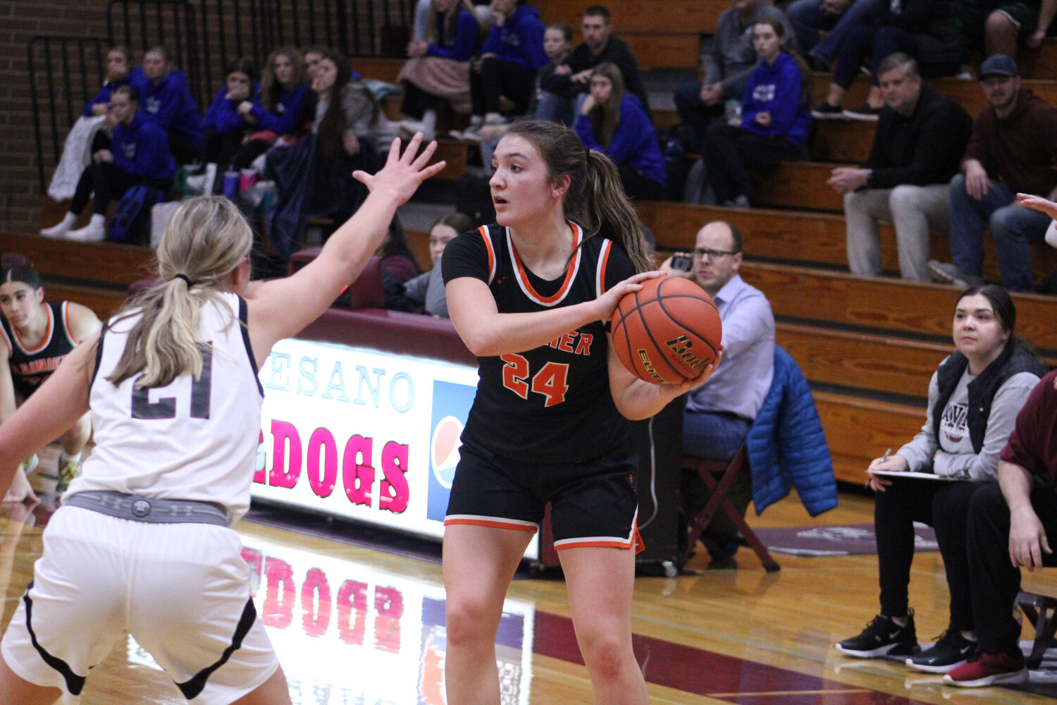 Bryn Beckman looks to pass to a teammate against Raymond-South Bend on Feb. 6.