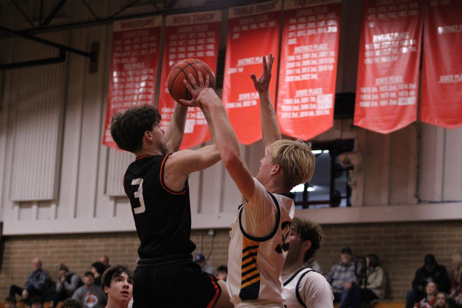 Josh Meldrum attempts a floater against Ilwaco on Feb. 9.